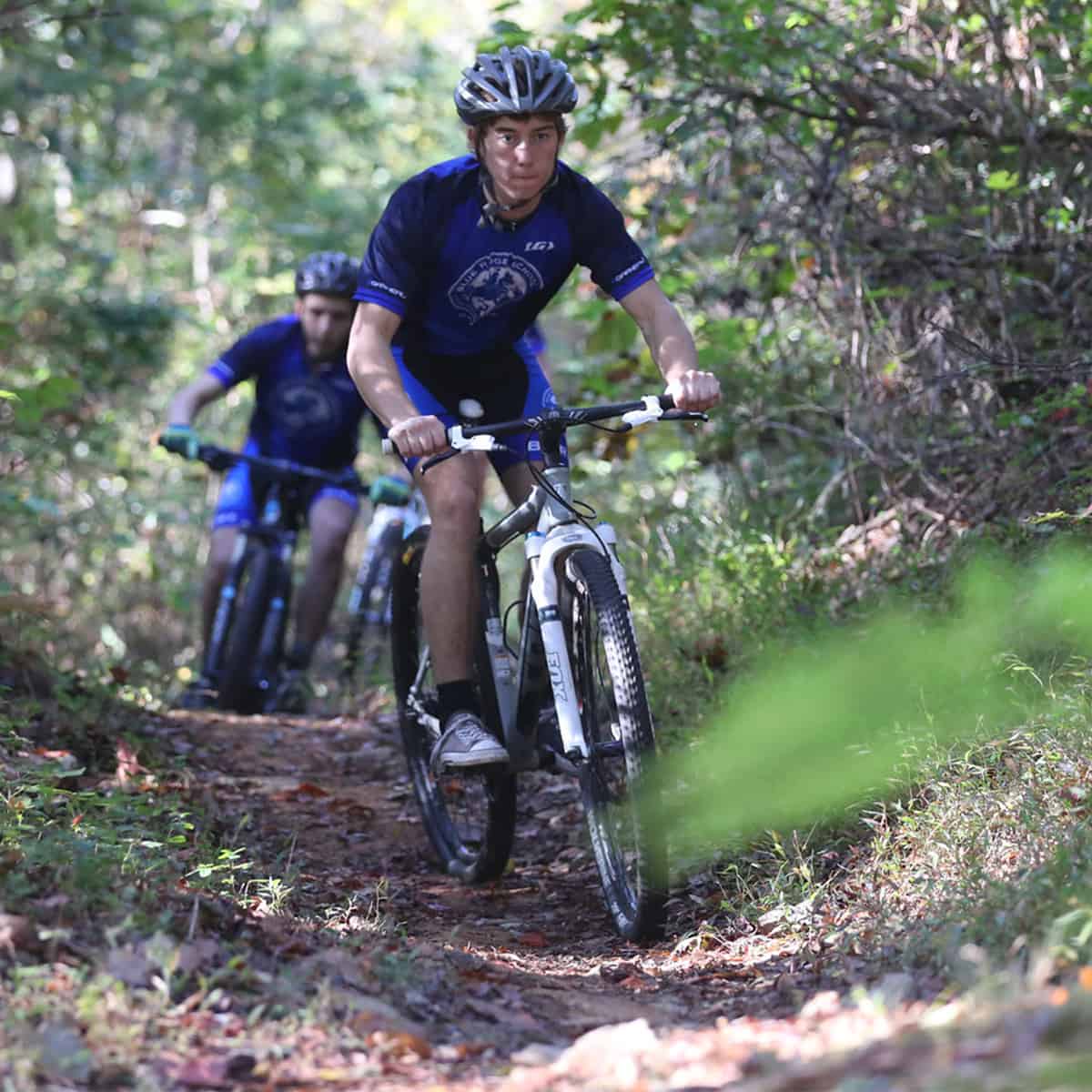 mountain biking down the trail