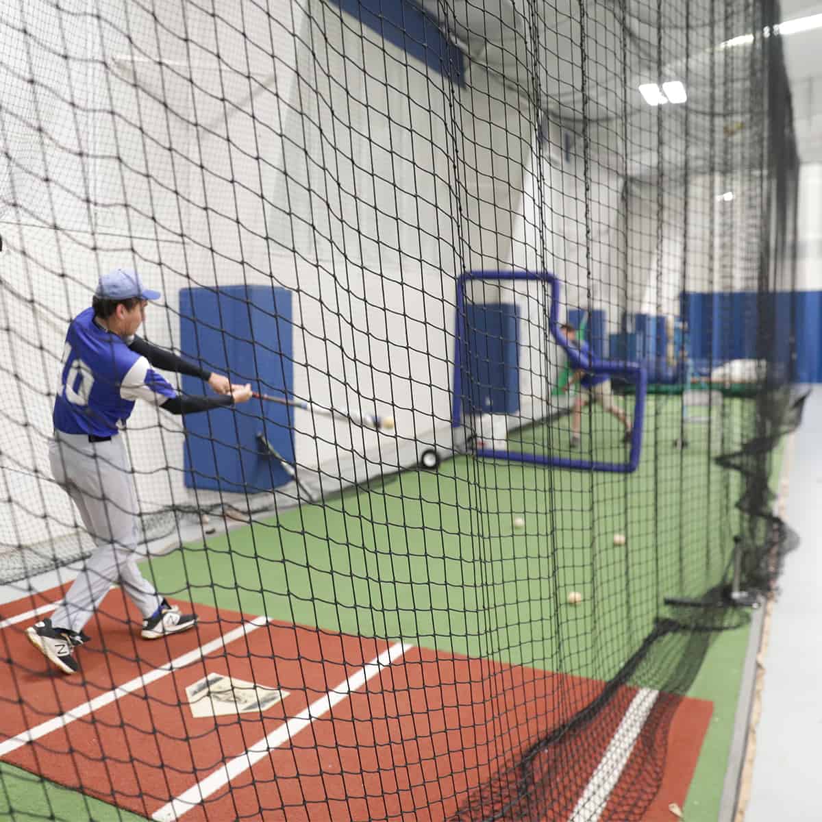 baseball player in the batting cage