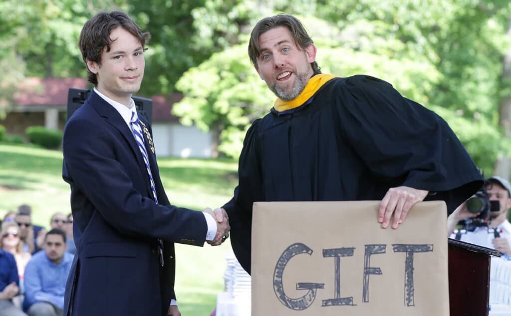 Presenting an award at graduation.
