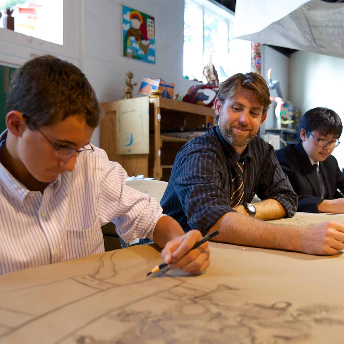 Teacher with students in art class.