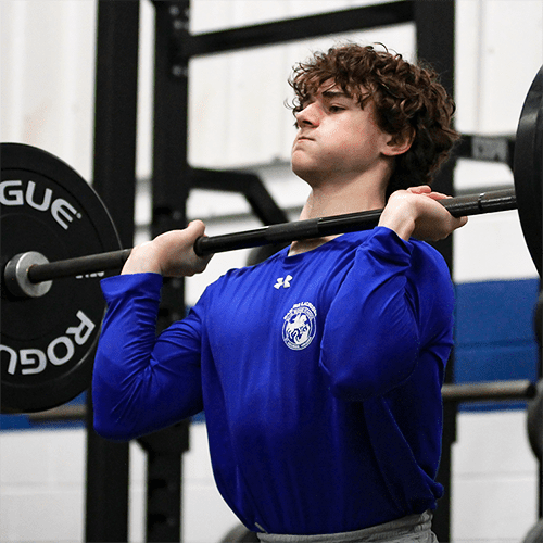 Strength training in the weight room at Blue Ridge School.